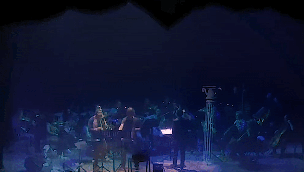A projected marble column appears to crash onstage.